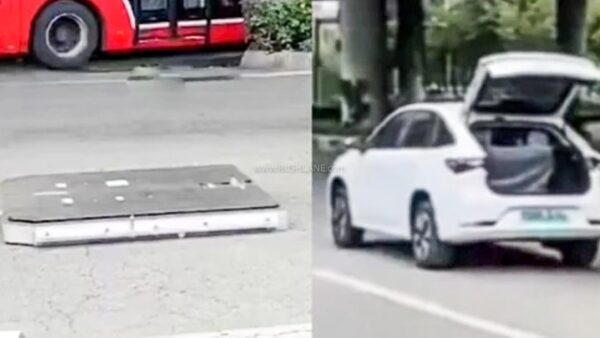 Electric car battery falls on road
