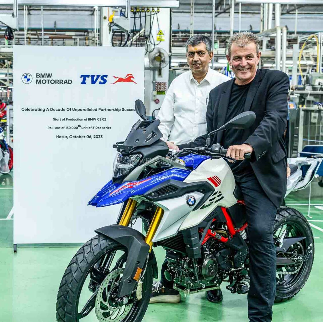 Mr. KN Radhakrishnan, Director & CEO, TVS Motor Company and Dr. Markus Shramm, Head of BMW Motorrad at the 150,000th unit roll-out of the 310 series